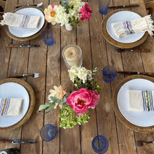 Load image into Gallery viewer, Dining table set with plates, flowers, and glasses on a wooden surface
